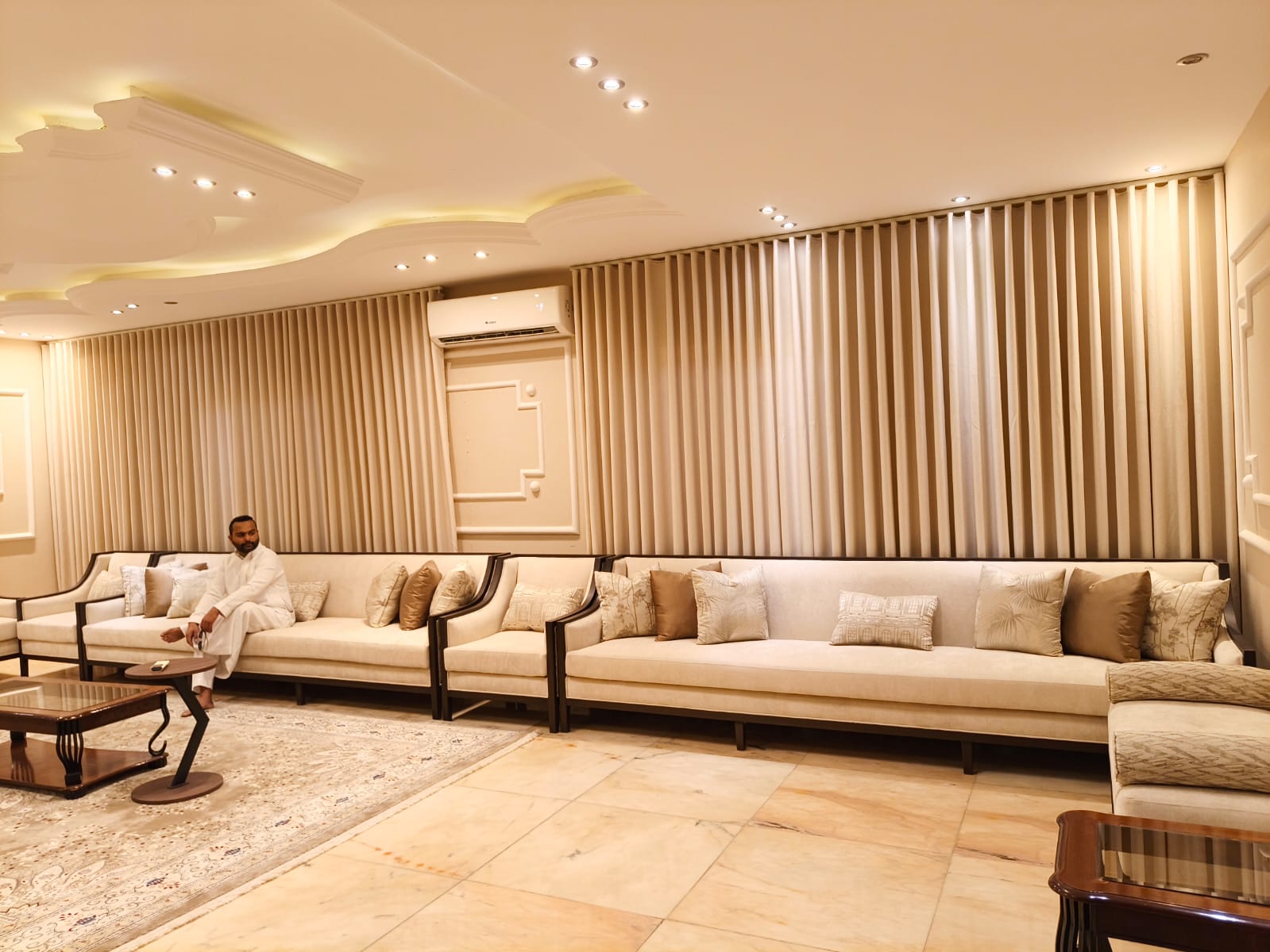Premium wave curtains installed in a Riyadh living room