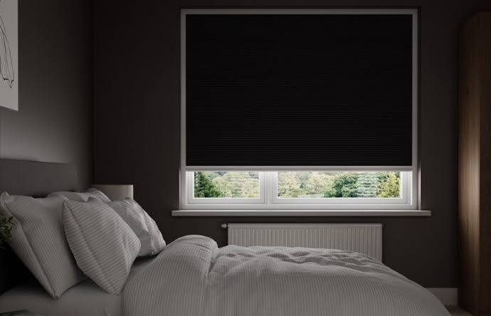 Roller curtain installed on a window in Riyadh
