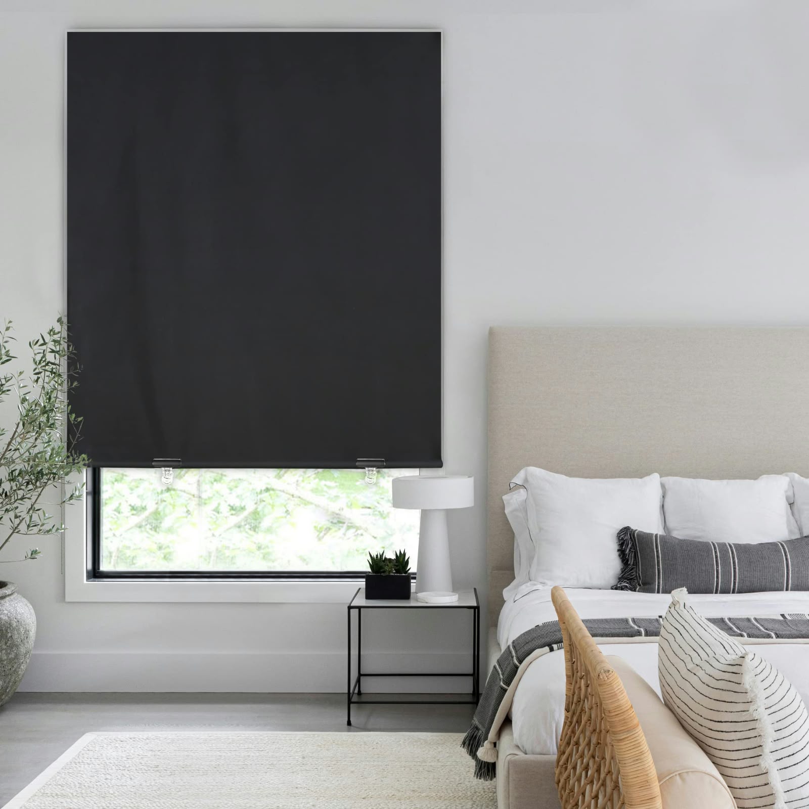 Blackout roller curtain in a bedroom