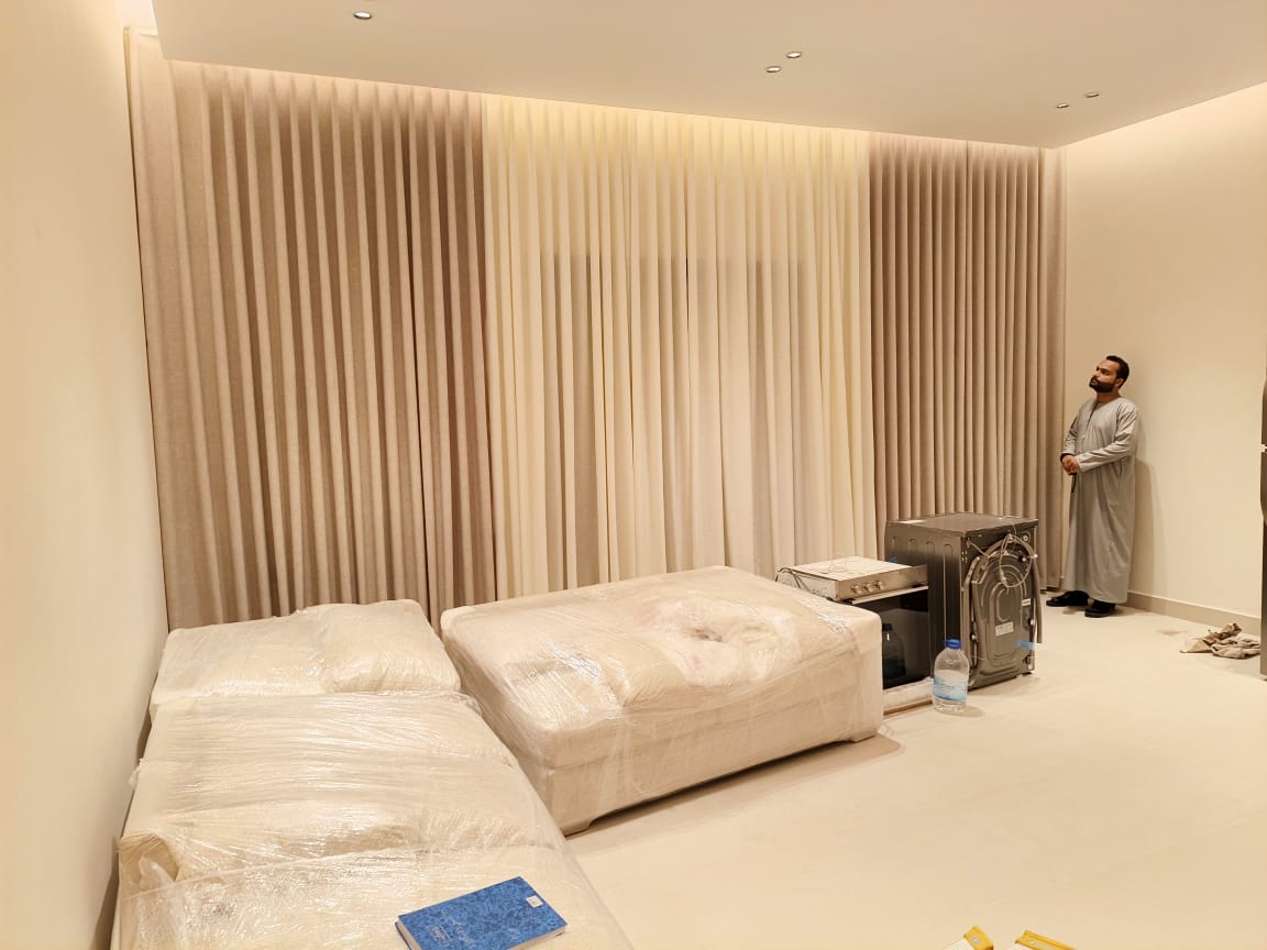 S-shaped wave curtain folds from ceiling to floor